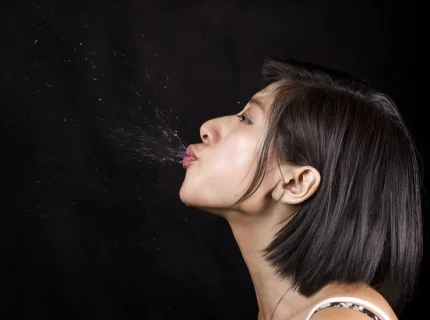 spitting